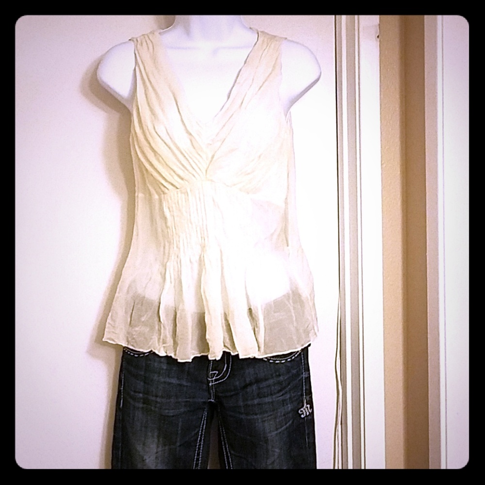 New DKNY sheer sleevless cream blouse
